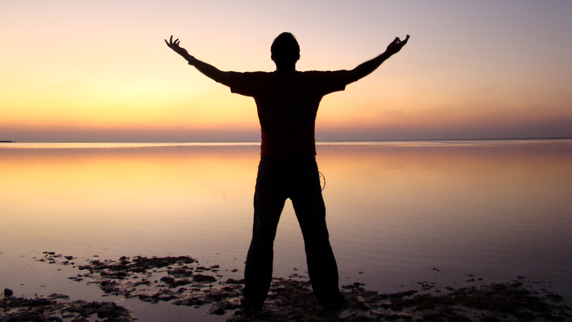 George Harb George Harb, man standing by the river at sunrise